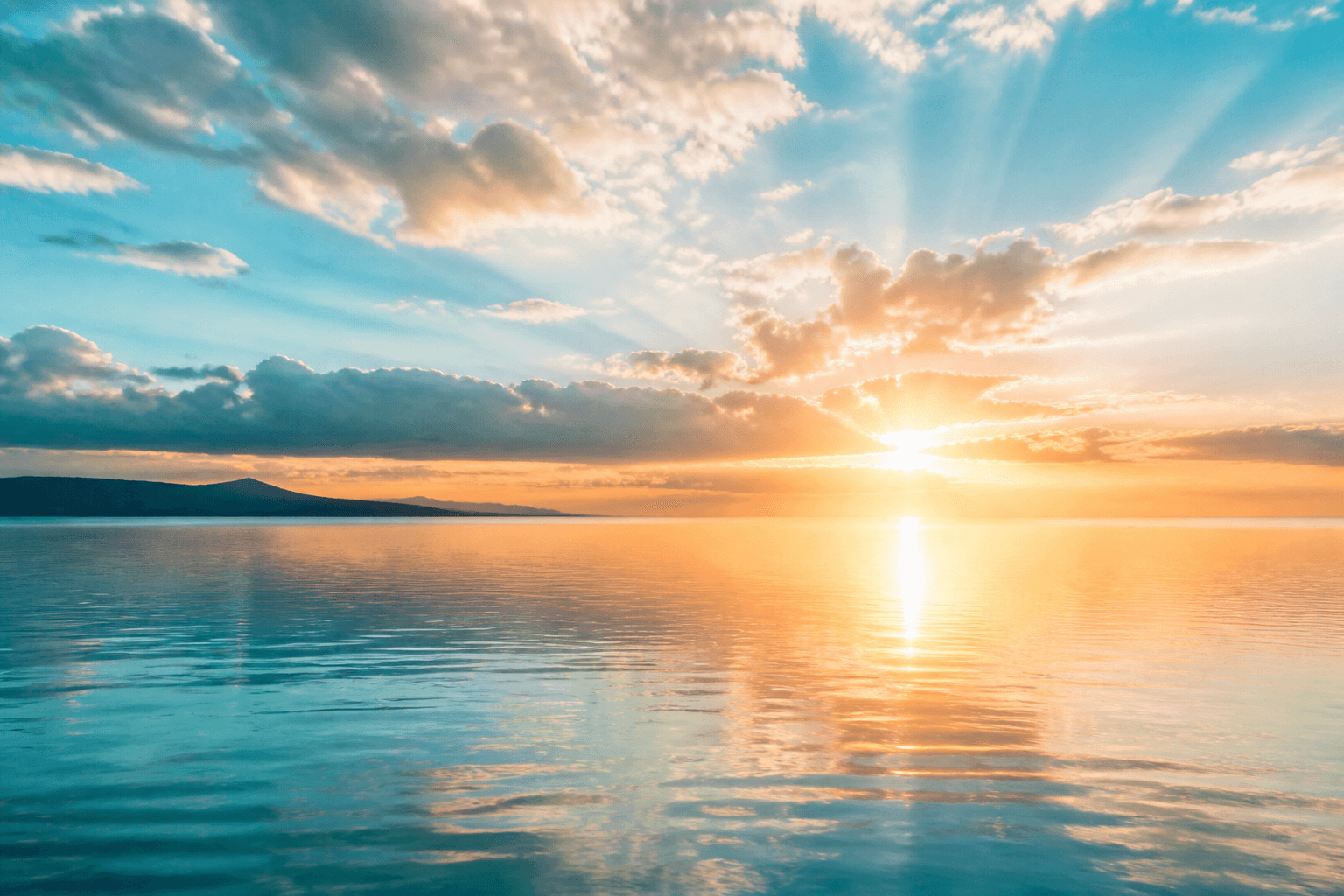 Hopeful sunrise over calm water, representing safety and new beginnings